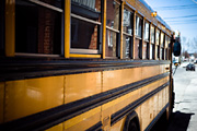 NY Police squad car collides with two school buses