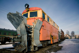 Snow plow truck driver crushed by freight train