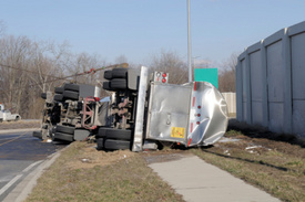 M.A. Truck Accident Report: Semi flips over in Beverly