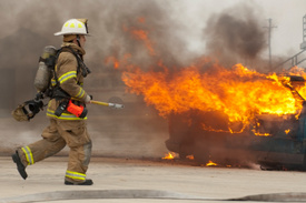 NY firefighter injured battling blazing truck
