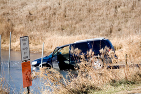 Three teens drown in lake after SUV rollover