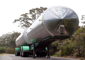 Woodbridge NJ tractor-trailer wreck: Overturned truck spills hazardous material